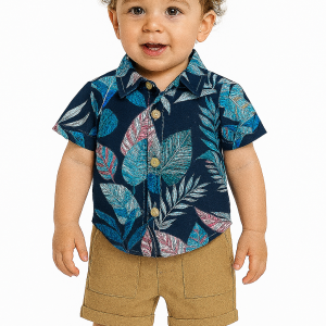 A toddler boy's summer outfit. The set includes a short- sleeve button-up shirt with a navy base and a bold tropical leaf print in shades of blue, purple, and red. It is paired with beige cuffed shorts featuring front pockets.