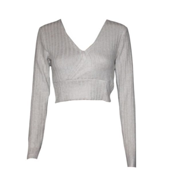 Long- sleeve V-neck ribbed crop top paired with jeans for a stylish and modern look