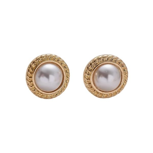 A pair of vintage - inspired stud earrings featuring round white pearls at the center, surrounded by a gold- tone textured halo. The design exudes timeless elegance, making these earrings perfect for both formal and everyday wear.