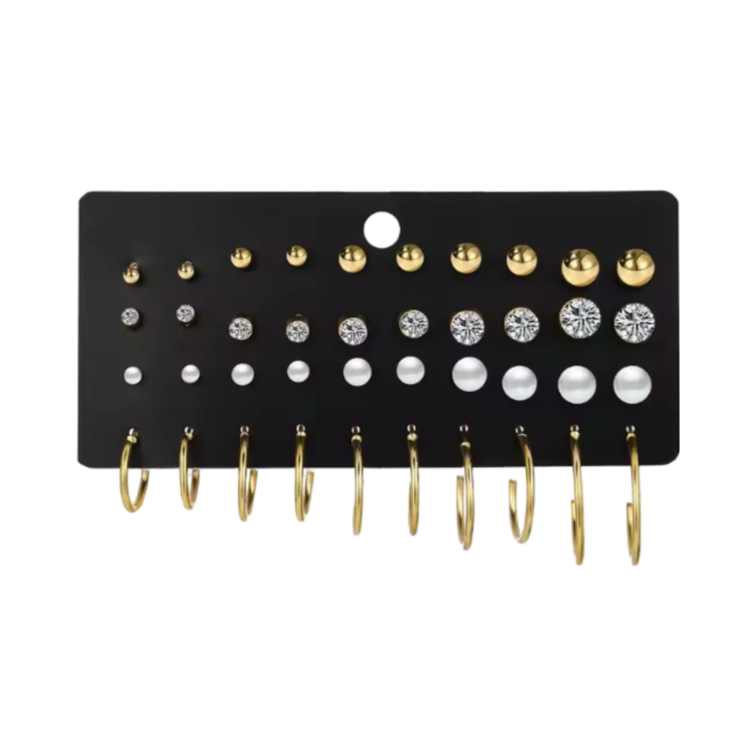 An Assorted collection of earrings, including gold- tone studs, crystal studs, pearl studs, and gold hoops in various sizes and designs.