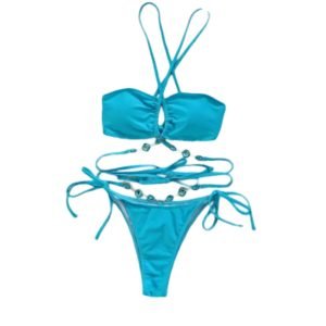 Crystal- Embellished Halter Bikini Set Stylish two- piece bikini in a bright blue color. The top features a halter- neck design with crisscross straps and ruching for a chic and modern look. The bottoms include side ties for adjustable comfort and decorative gemstone- like embellishments along the straps, adding a touch of elegance to he overall design.