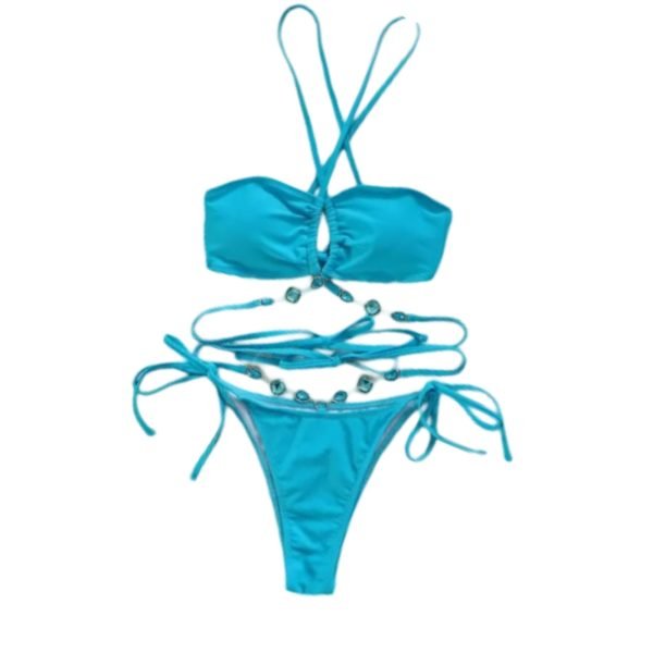 Stylish two- piece bikini in a bright blue color. The top features a halter- neck design with crisscross straps and ruching for a chic and modern look. The bottoms include side ties for adjustable comfort and decorative gemstone- like embellishments along the straps, adding a touch of elegance to he overall design.