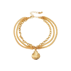 A gold layered anklet featuring multiple chain designs and a seashell charm, combining elegance with a coastal- inspired touch.