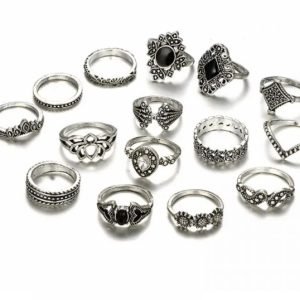 Collection of vintage- inspired silver rings featuring intricate bohemian designs, including geometric patterns, lotus motifs, and gemstone accents, perfect for stacking and accessorizing.