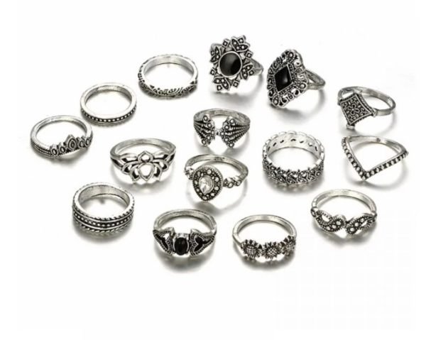 Collection of vintage- inspired silver rings featuring intricate bohemian designs, including geometric patterns, lotus motifs, and gemstone accents, perfect for stacking and accessorizing.
