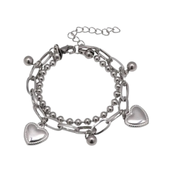 Silver bracelet featuring a mix of chain links, small beads, and two heart- shaped charms. The bracelet has a clasp and an adjustable chain for sizing. The overall aesthetic is shiny and delicate, with a playful design.